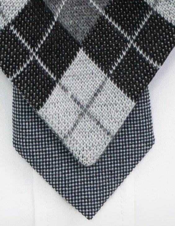 Women's necktie Handmade necktie Premium quality tie Original design tie Black and white necktie Monochrome tie Unique women's accessory Artisan neckwear Designer women's tie Stylish neck accessory Fashionable women's accessory Elegant necktie Contemporary design tie Handcrafted women's tie Custom-made neckwear