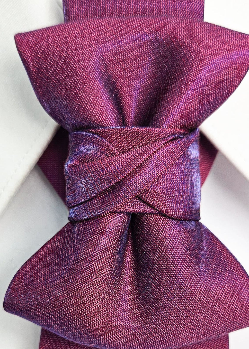 Purple bow tie on a white shirt fashionable, elegant, sophisticated, chic, modern, unique, exclusive, luxurious, high-end, premium, quality, handmade, artisan, bespoke, tailored, custom, designer, trendy, vogue, modish, smart, classy, stylish, fashion-forward, contemporary, women's fashion, ladies' wear, apparel, clothing, attire, garment, outfit, ensemble, get-up, dress, gown, frock, top, blouse, shirt, sweater, jacket, coat, blazer, skirt, trousers, pants, jeans, shorts, leggings, jumpsuit, romper, suit, 