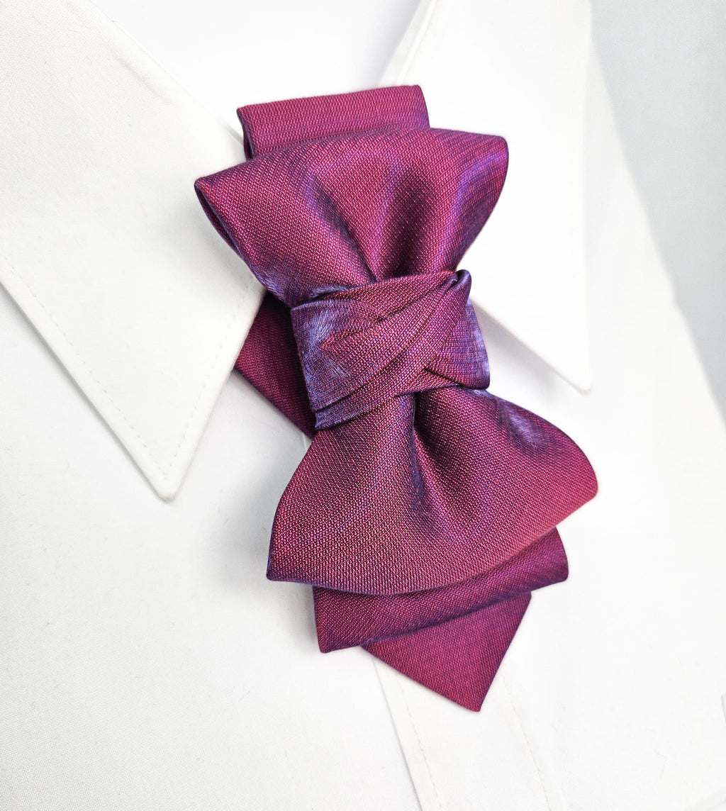 Purple bow tie on a white background Handmade luxury fashion neck accessory, women's necktie accessory, purple satin necktie choker, gold choker with fabric tie, elegant women's neckwear, unique fashion accessory, stylish purple necktie for women, luxury handmade choker, modern neck accessory for women, fashionable women's tie necklace, chic and sophisticated neckpiece, bespoke fabric tie, artisan crafted neckwear, high-end ladies' accessory, formal women's tie, statement neck accessory, contemporary design