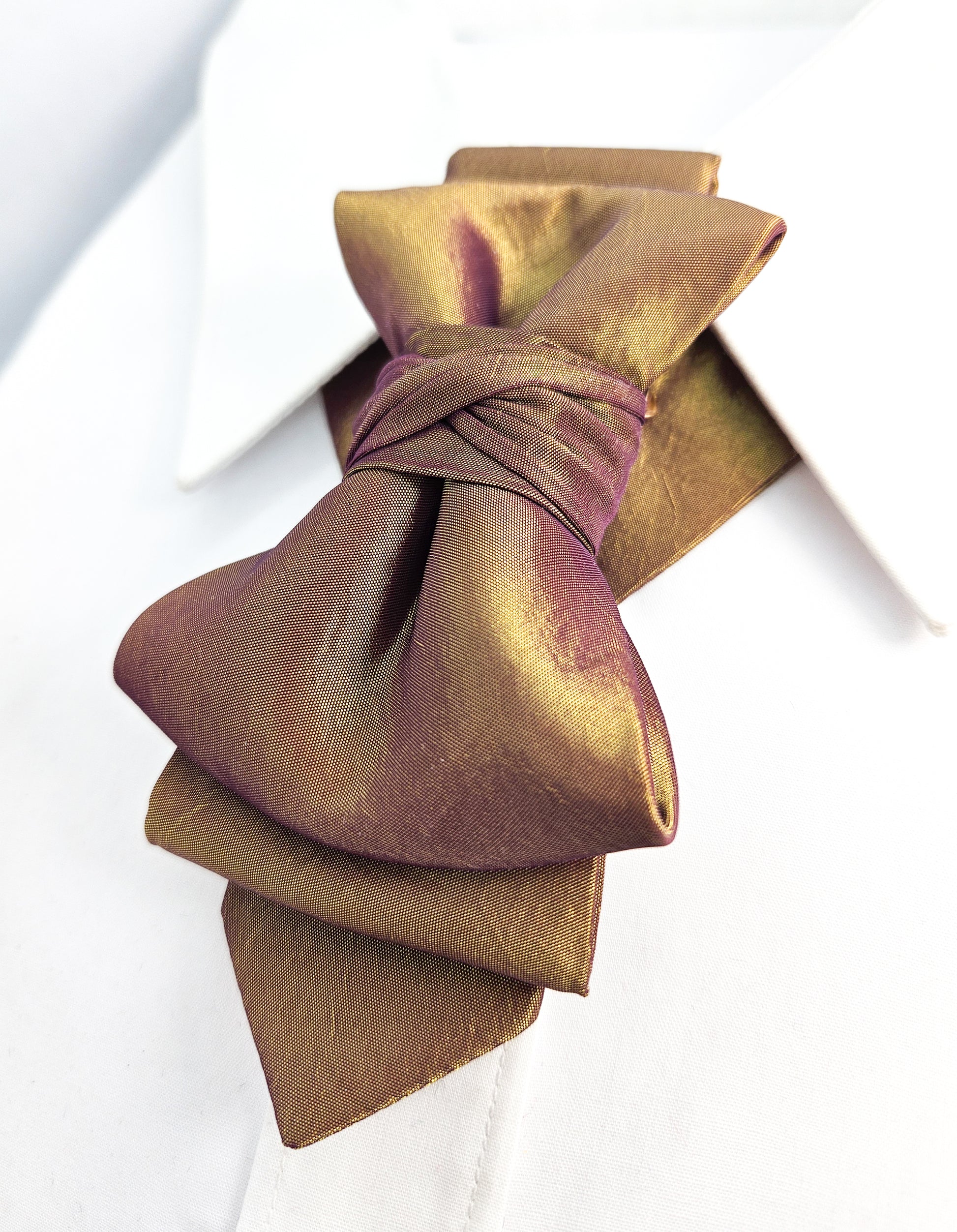 Gold bow tie on a white shirt metallic plum gold womens necktie, bronze burgundy metallic bow tie for women, chameleon fabric neck accessory, handmade statement necktie, sculptural womens neckwear, metallic plum bronze neckpiece, luxury handmade womens neck accessory, artistic fabric necktie, modern designer womens bow tie, elegant metallic neckwear, unique womens fashion necktie, gold burgundy neck accessory, contemporary statement neckpiece