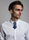 Handmade blue bow tie with butterfly print, Pre-tied bow tie for special occasions, Elegant unisex accessory with colorful butterflies, Blue bow tie with vibrant butterfly pattern, Luxury butterfly bow tie in gift box, Family-friendly handmade tie from Lithuania, Stylish blue bow tie for all ages, Fashion bow tie designed by Rūta Piekurienė
