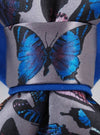 Handmade blue bow tie with butterfly print, Pre-tied bow tie for special occasions, Elegant unisex accessory with colorful butterflies, Blue bow tie with vibrant butterfly pattern, Luxury butterfly bow tie in gift box, Family-friendly handmade tie from Lithuania, Stylish blue bow tie for all ages, Fashion bow tie designed by Rūta Piekurienė