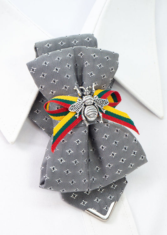 Bow tie "Bitute pilkoji" is a work, dedicated to the birthday of Vilnius, the capital of Lithuania.  Brass Vytis adorns the original knot of three fabrics. Keistas kaklaraištis, nematyta peteliškė, Vilniaus kaklaraištis, Kaklaraištis žiogas, keista varlytė, formal female bow tie outfits