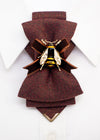 Women's luxury tie
Elegant caramel-colored tie
Chameleon fabric necktie
Brown, burgundy, and gold tie
Handmade women's tie
Textured matte fabric tie
Ribbon and bee embellishment tie
Statement fashion accessory
Unique conversation starter tie
High-quality artisan tie
Refined women's neckwear
Sophisticated tie with bee detail
Warm-toned luxury necktie
Stylish tie for women
Designer handmade necktie
