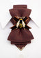 Women's luxury tie
Elegant caramel-colored tie
Chameleon fabric necktie
Brown, burgundy, and gold tie
Handmade women's tie
Textured matte fabric tie
Ribbon and bee embellishment tie
Statement fashion accessory
Unique conversation starter tie
High-quality artisan tie
Refined women's neckwear
Sophisticated tie with bee detail
Warm-toned luxury necktie
Stylish tie for women
Designer handmade necktie

