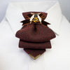 Women's luxury tie
Elegant caramel-colored tie
Chameleon fabric necktie
Brown, burgundy, and gold tie
Handmade women's tie
Textured matte fabric tie
Ribbon and bee embellishment tie
Statement fashion accessory
Unique conversation starter tie
High-quality artisan tie
Refined women's neckwear
Sophisticated tie with bee detail
Warm-toned luxury necktie
Stylish tie for women
Designer handmade necktie