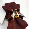 Women's luxury tie
Elegant caramel-colored tie
Chameleon fabric necktie
Brown, burgundy, and gold tie
Handmade women's tie
Textured matte fabric tie
Ribbon and bee embellishment tie
Statement fashion accessory
Unique conversation starter tie
High-quality artisan tie
Refined women's neckwear
Sophisticated tie with bee detail
Warm-toned luxury necktie
Stylish tie for women
Designer handmade necktie
