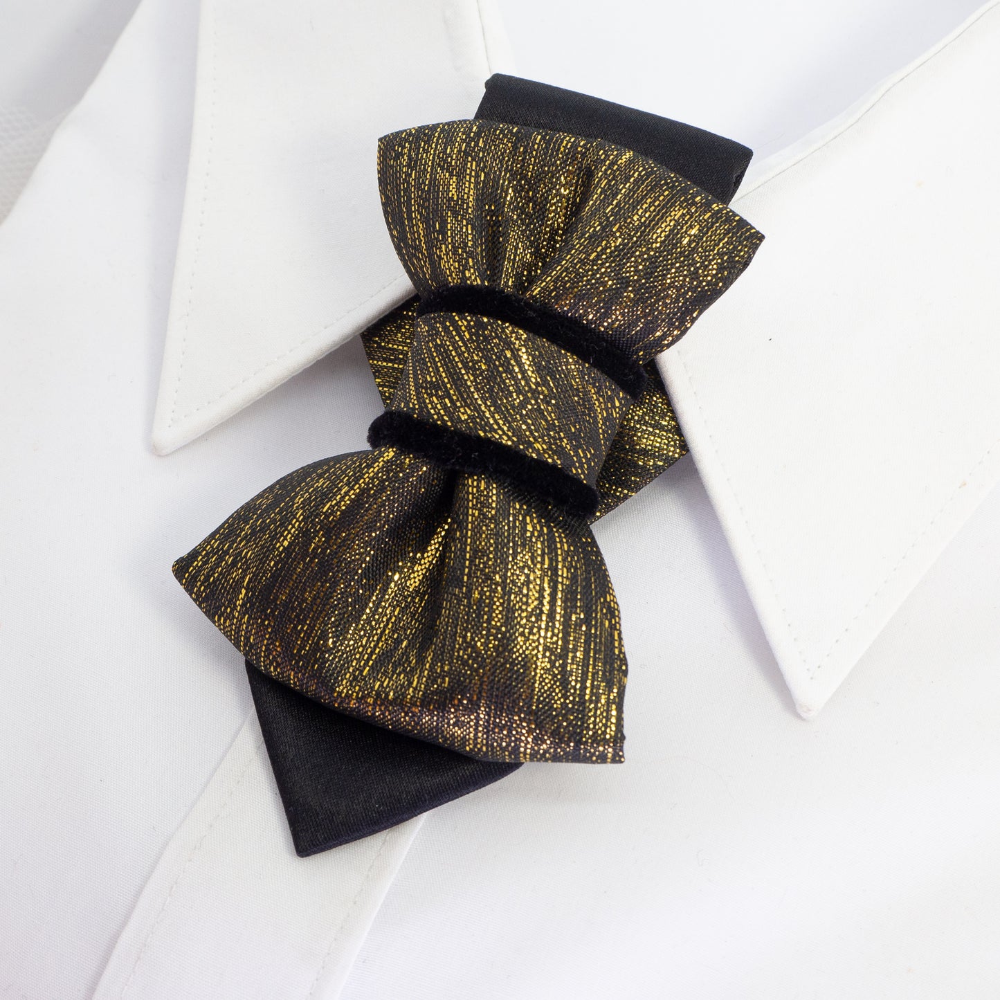 black gold womens necktie, luxury necktie for women, handmade necktie, statement accessory, elegant womens tie, unique gift for her, versatile neckwear, brooch pendant tie, modern necktie, Rūta Piekurienė design, Lithuanian handmade tie, formal accessory women, artistic necktie, special occasion tie, fashion tie for women, pre tied womens necktie, designer neckwear, black and gold tie, edgy womens fashion, dressy necktie