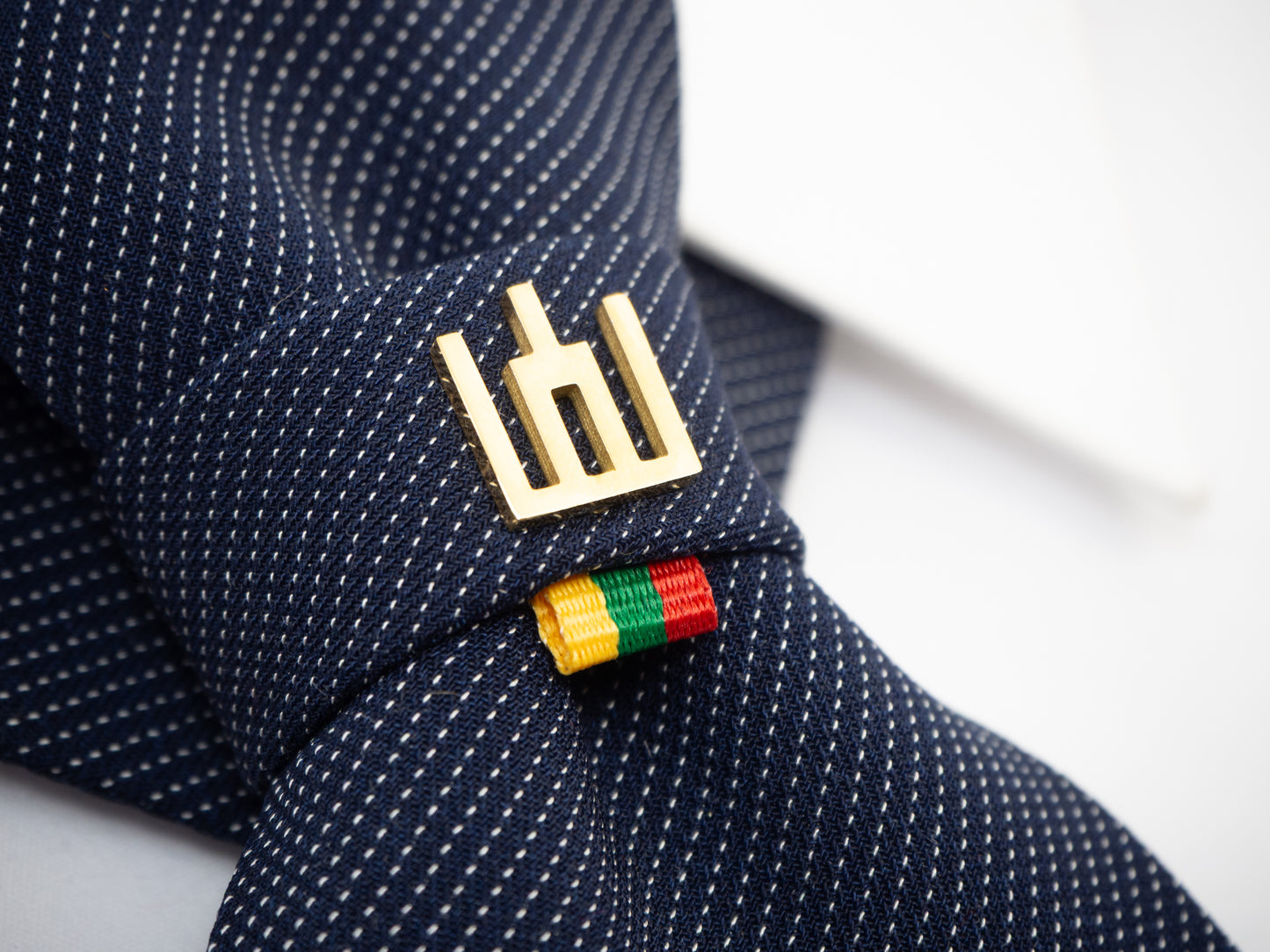 Lithuanian heritage necktie, Gediminas Pillars tie, handmade symbolic tie, Baltic cultural accessory, jabot style neckwear, patriotic men’s fashion, tricolor ribbon necktie, freedom identity tie, elegant historical neckwear, Baltic pride tie, artisan men’s tie, traditional symbol cravat, modern ethnic accessory, small nation support fashion, Mediterranean style tie

