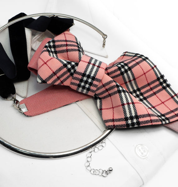 Pink plaid bow tie with a black and white pattern on a white surface Handmade luxury women’s necktie accessory in pink plaid design, unique wedding and special occasion neckwear, elegant fashion statement tie, modern alternative to bow tie, handcrafted designer accessory for bride, bridesmaid, or stylish guest, exclusive feminine neck accessory, chic and artistic neckwear gift, original handmade women’s fashion detail for parties, events, and luxury outfits.