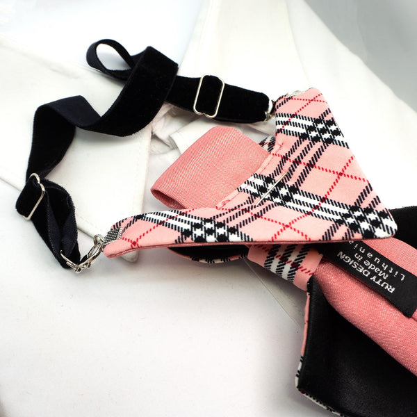Pink and black plaid dog muzzle with a black strap on a white background Handmade luxury women’s necktie accessory in pink plaid design, unique wedding and special occasion neckwear, elegant fashion statement tie, modern alternative to bow tie, handcrafted designer accessory for bride, bridesmaid, or stylish guest, exclusive feminine neck accessory, chic and artistic neckwear gift, original handmade women’s fashion detail for parties, events, and luxury outfits.