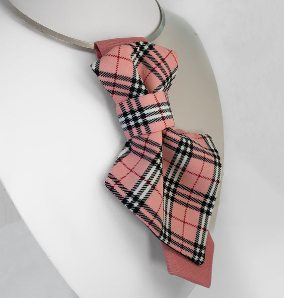 Pink and black plaid bow tie on a white background Handmade luxury women’s necktie accessory in pink plaid design, unique wedding and special occasion neckwear, elegant fashion statement tie, modern alternative to bow tie, handcrafted designer accessory for bride, bridesmaid, or stylish guest, exclusive feminine neck accessory, chic and artistic neckwear gift, original handmade women’s fashion detail for parties, events, and luxury outfits.