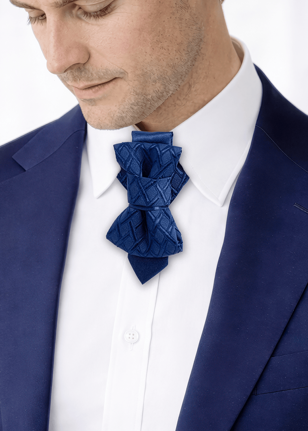 blue bow tie, wedding bow tie, elegant and unique necktie, unique design blue unisex tie, statement blue necktie, modern wedding bowtie, luxury blue bow tie detail, handmade blue neck accessory, elegant unisex bow tie, designer blue necktie, artistic blue bow tie, contemporary wedding neckwear, stylish blue unisex tie, the tie that changes your look, premium blue bow tie on white shirt, modern formal neck accessory