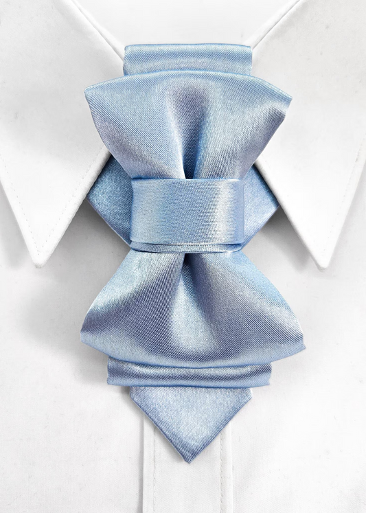 Light blue bow tie on a white geometric patterned background ice blue bow tie women, vertical bow tie, satin bow tie light blue, glacier blue necktie, women statement tie, unisex bow tie, modern bow tie design, sculptural neckwear, elegant women neck accessory, minimalist fashion accessory, wedding guest bow tie, light blue formal tie, unique designer bow tie, artistic neckwear piece, premium satin bow tie, women formal outfit accessory, stylish office outfit women, contemporary fashion tie, handmade statem