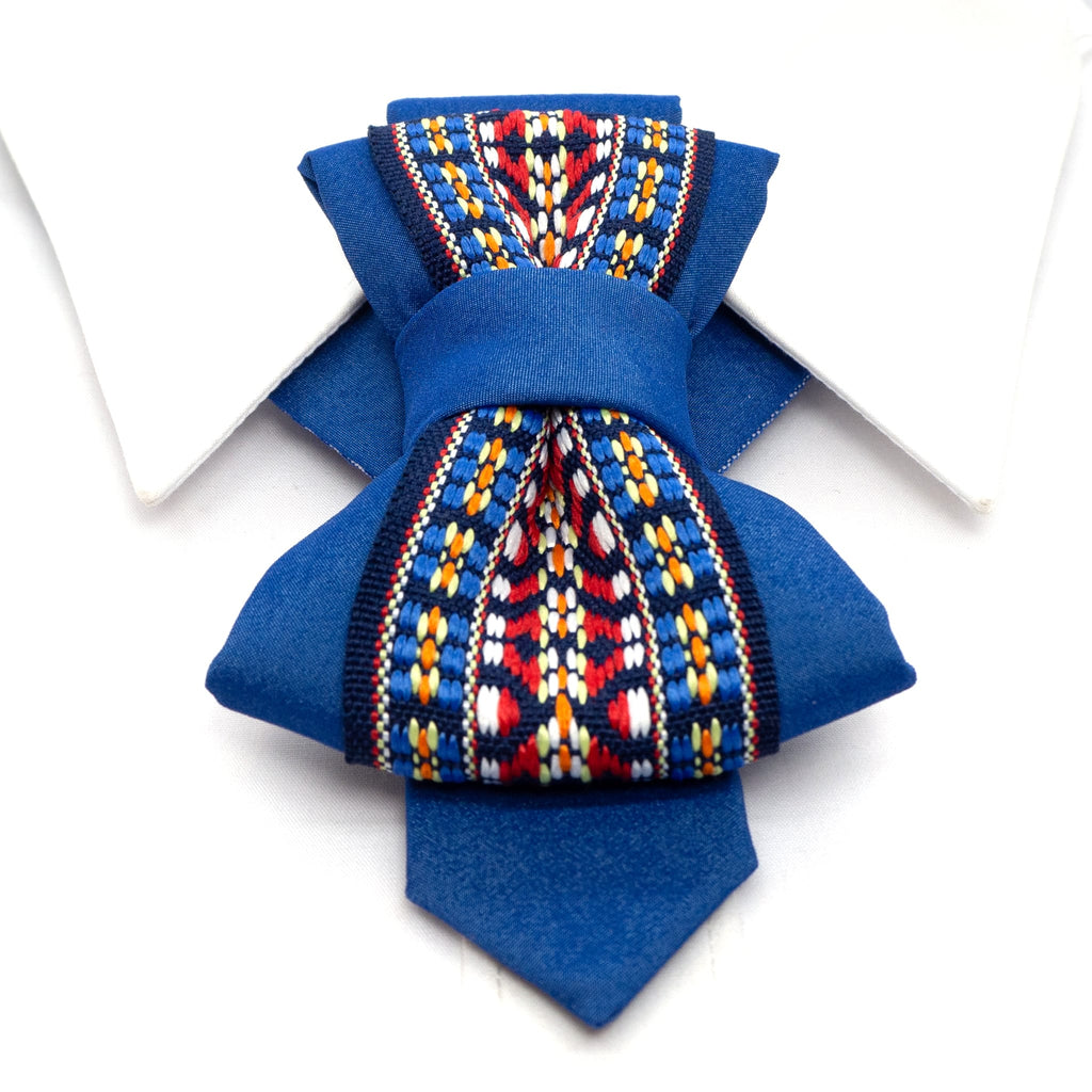 Handmade blue vertical bow tie with unique modern design
Elegant unisex necktie for special occasions, weddings, and concerts
Luxury blue tie inspired by water paths, handmade in Lithuania
Artistic vertical bow tie for musicians, grooms, and fashion lovers
Exclusive European-designed bow tie with an innovative shape
Deep blue modern necktie, perfect for bold and stylish outfits
Unique statement accessory for men and women, handcrafted tie
Sophisticated and contemporary vertical bow tie