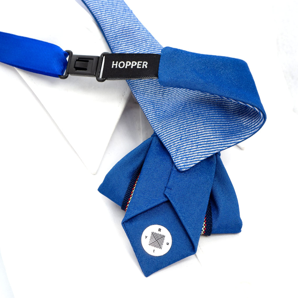Handmade blue vertical bow tie with unique modern design
Elegant unisex necktie for special occasions, weddings, and concerts
Luxury blue tie inspired by water paths, handmade in Lithuania
Artistic vertical bow tie for musicians, grooms, and fashion lovers
Exclusive European-designed bow tie with an innovative shape
Deep blue modern necktie, perfect for bold and stylish outfits
Unique statement accessory for men and women, handcrafted tie
Sophisticated and contemporary vertical bow tie