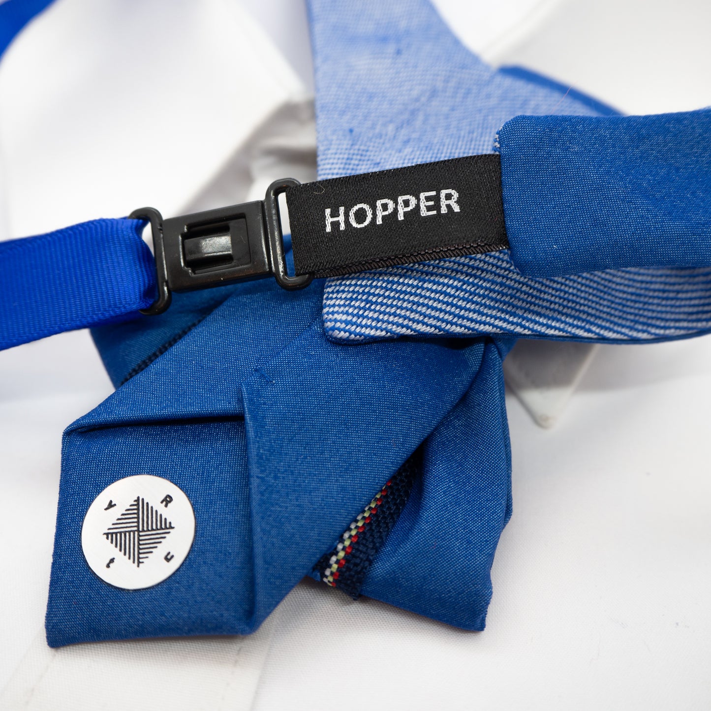 Handmade blue vertical bow tie with unique modern design
Elegant unisex necktie for special occasions, weddings, and concerts
Luxury blue tie inspired by water paths, handmade in Lithuania
Artistic vertical bow tie for musicians, grooms, and fashion lovers
Exclusive European-designed bow tie with an innovative shape
Deep blue modern necktie, perfect for bold and stylish outfits
Unique statement accessory for men and women, handcrafted tie
Sophisticated and contemporary vertical bow tie