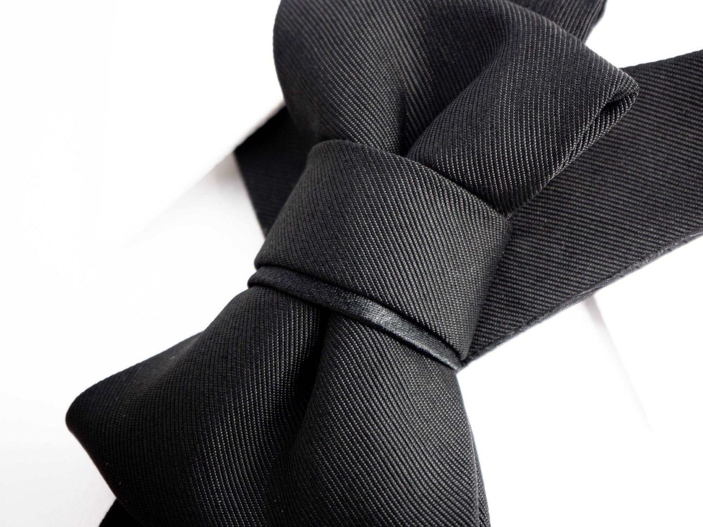Classic black handmade men tie close up view