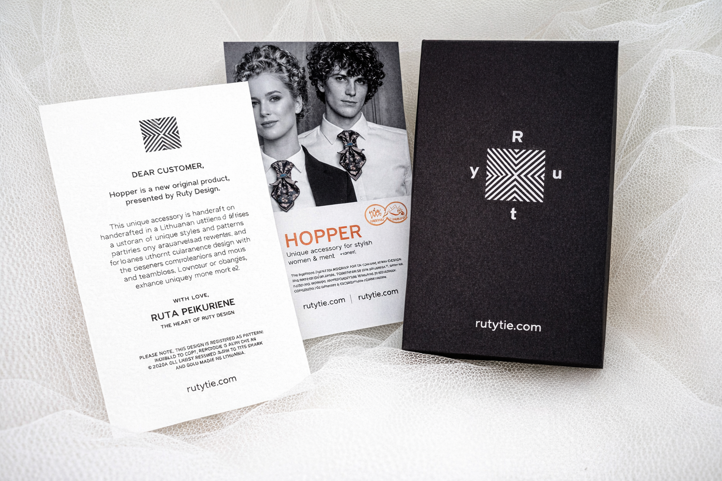 Ryute brand materials including a black box, leaflet, and card on a textured white surface.