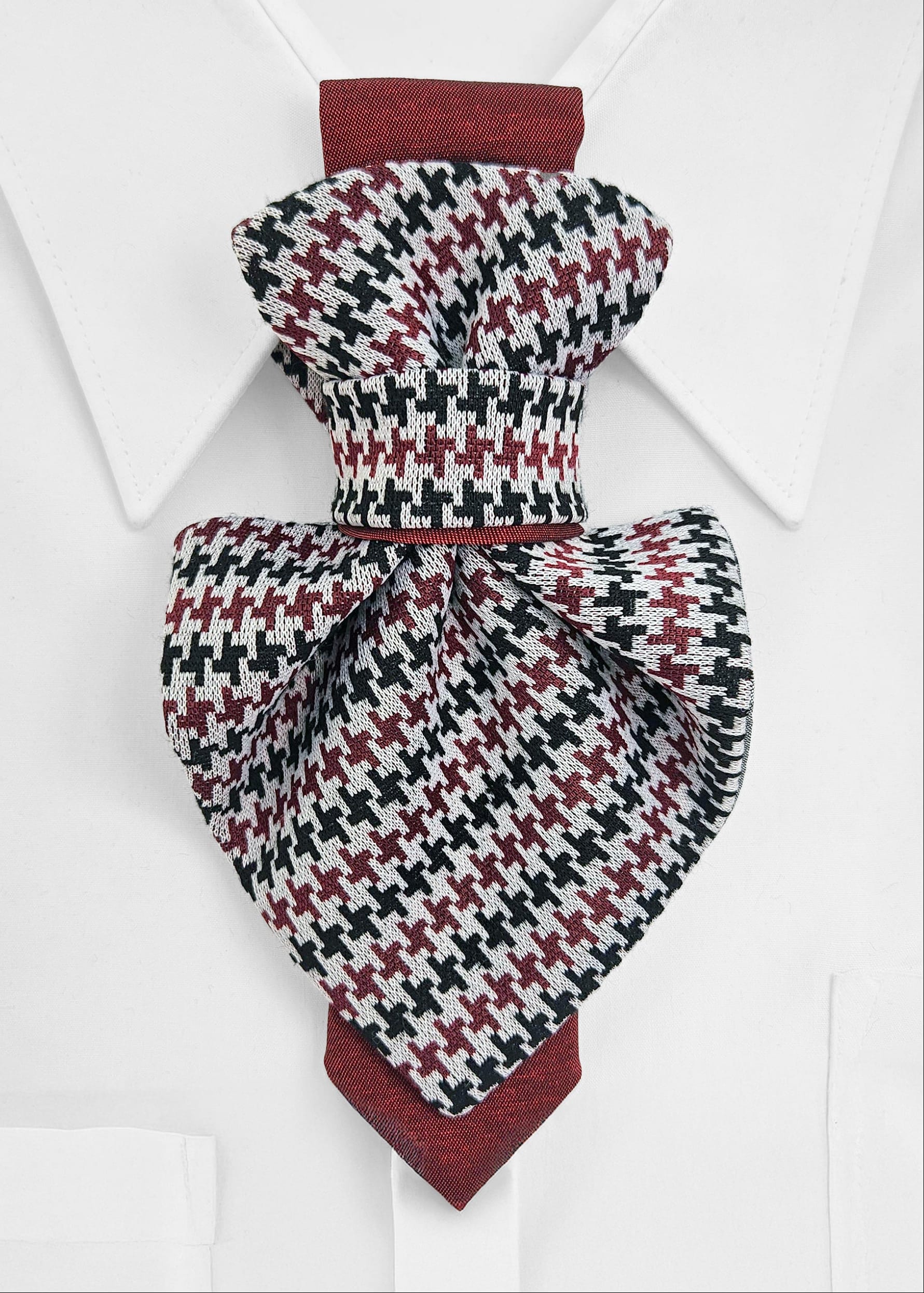 Pair of houndstooth patterned socks on a white background premium handmade knitted houndstooth tie in burgundy, luxury italian silk wool blend necktie with red pied-de-poule pattern, unique red and black patterned tie for wedding or business attire, close-up of high-quality wool knit scarf style tie with abstract design, elegant burgundy and black dogtooth patt