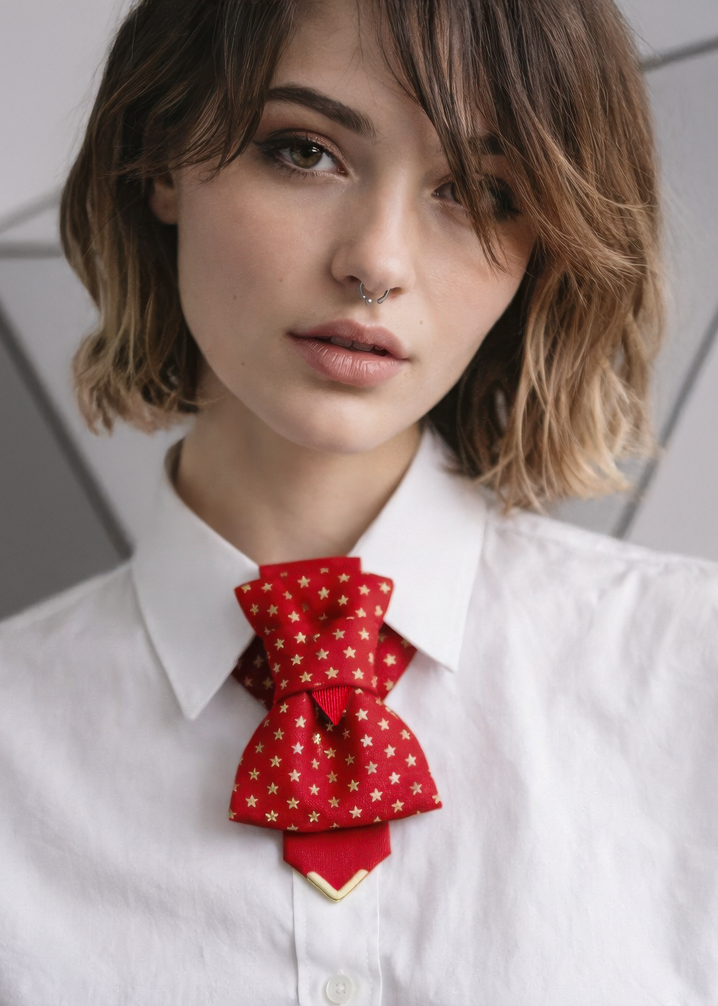 Red star pattern bow tie necklace for women, Handmade red statement neck accessory, Gold star fabric bow collar jewelry, Unique women necktie alternative fashion piece, Artistic red bow necklace for white shirt styling, Modern feminine neck accessory with gold detail, Couture style fabric bow tie for women, Elegant red collar statement jewelry, Festive red star bow neckpiece gift for her, Designer women tie necklace handmade, Bold red fashion accessory editorial style, Red bow collar necklace with gold acce