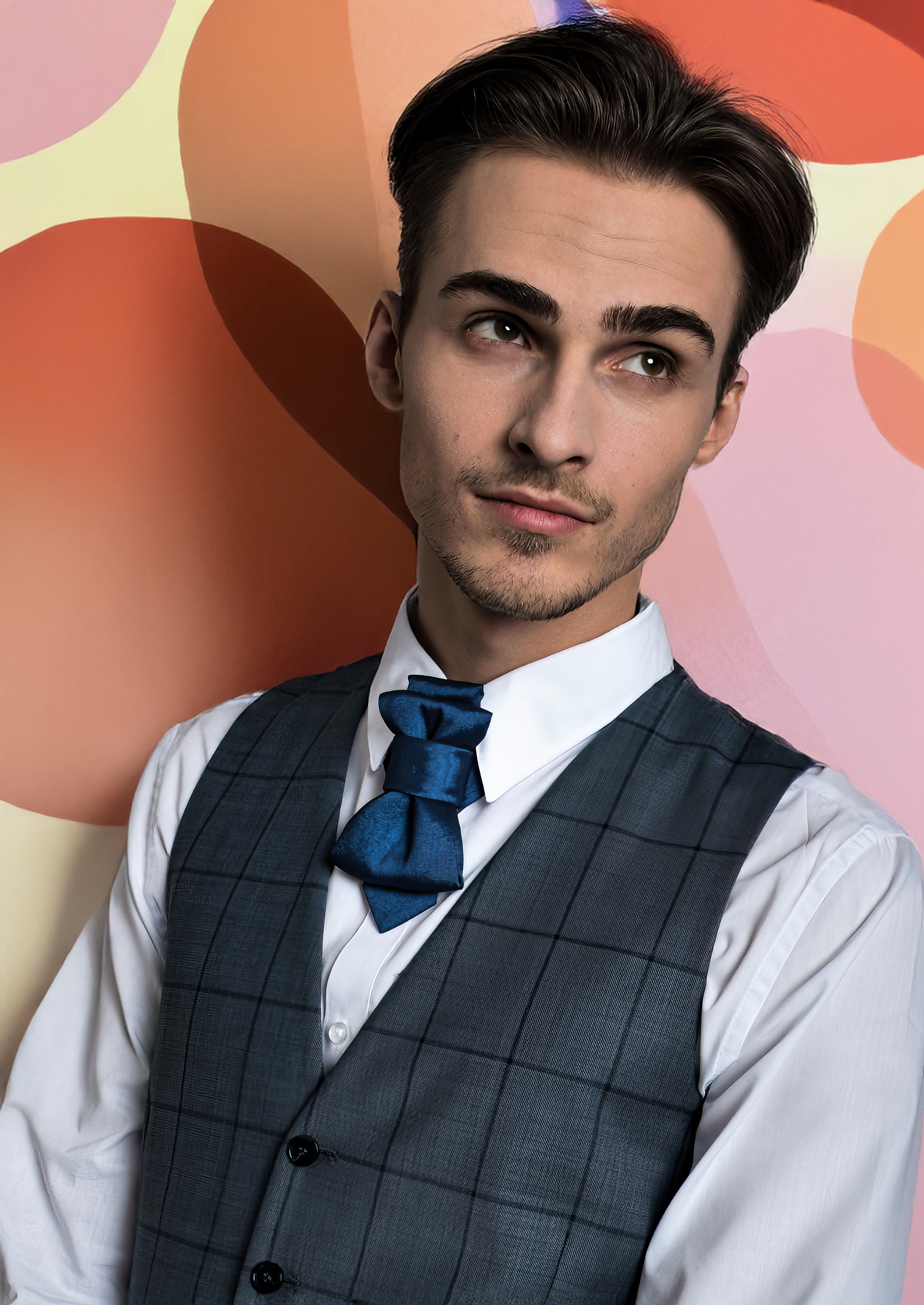 Man wearing a gray checkered vest and blue bow tie against a colorful abstract background, navy blue necktie, handmade wedding tie, elegant bow tie, unique groom accessory, modern neckwear, layered necktie, men's formal tie, performer tie, musician accessory, deep blue tie, minimalist tie, stylish men's accessory, stage outfit, luxury necktie, ruty design tie HOPPER TIE LACONIC