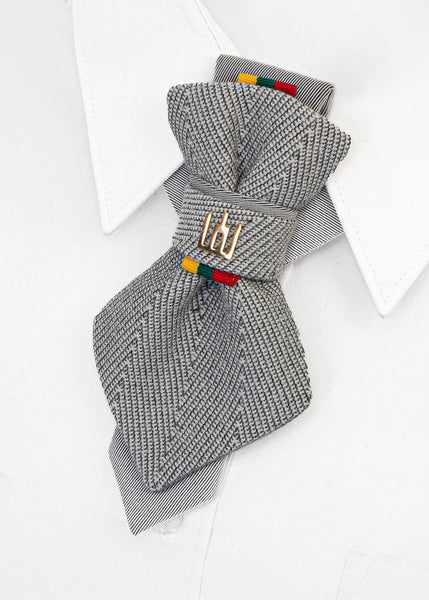 Gray knitted bow tie with colorful accents on a white background handmade luxury wedding necktie, vertical bow tie, Lithuanian Gedimino Stulpai pin, silver patterned tie, unisex formal accessory, unique design neckwear, groom tie, national symbol fashion, elegant menswear, statement necktie, artistic bow tie, heritage inspired tie, luxury gift for him or her