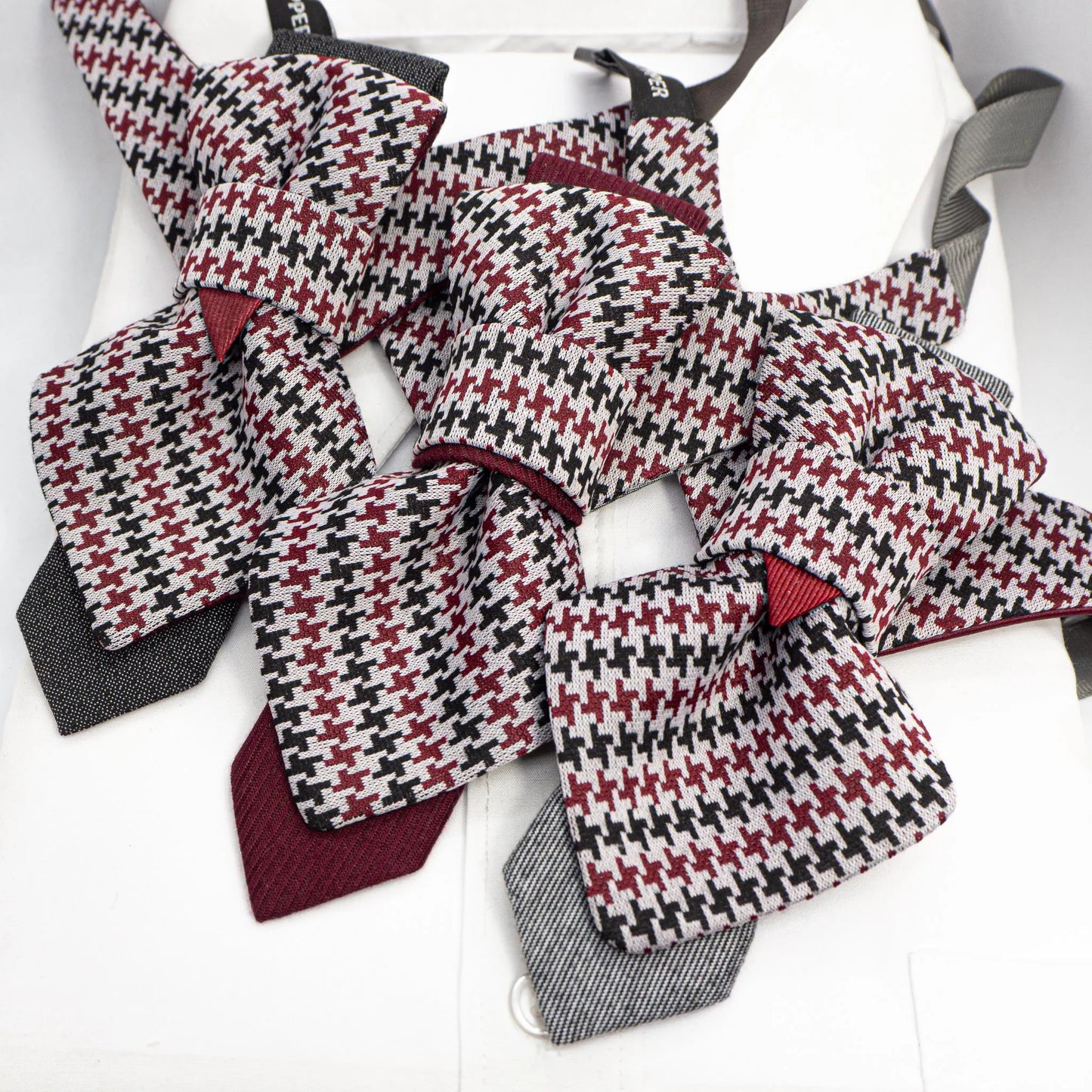 handmade luxury unisex necktie, vertical bow tie, houndstooth pattern, red black white tie, artistic necktie, wedding accessory, groom gift, musician style, luxury tie, unique neckwear, statement tie, formal fashion, sculptural tie, designer bow tie