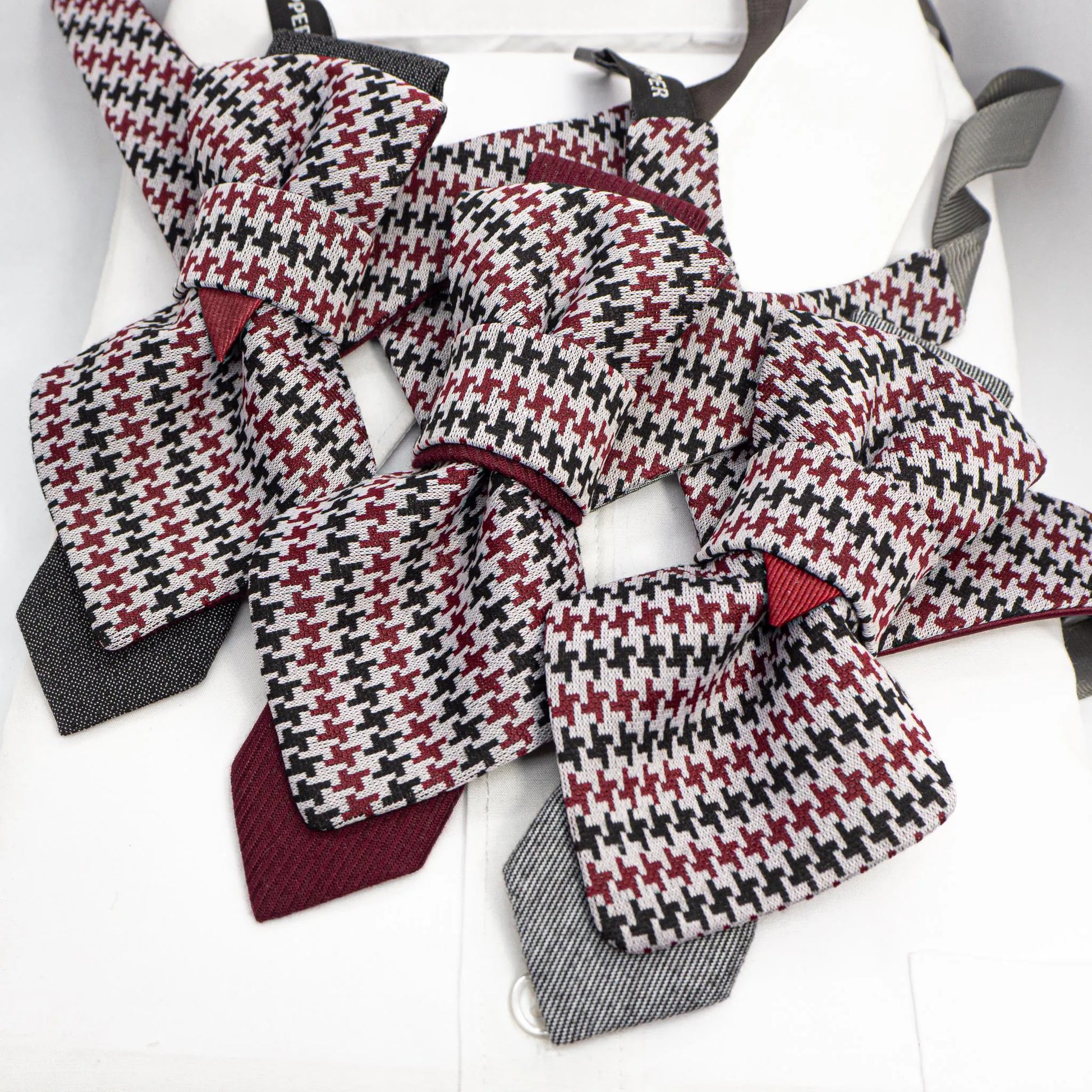handmade luxury unisex necktie, vertical bow tie, houndstooth pattern, red black white tie, artistic necktie, wedding accessory, groom gift, musician style, luxury tie, unique neckwear, statement tie, formal fashion, sculptural tie, designer bow tie