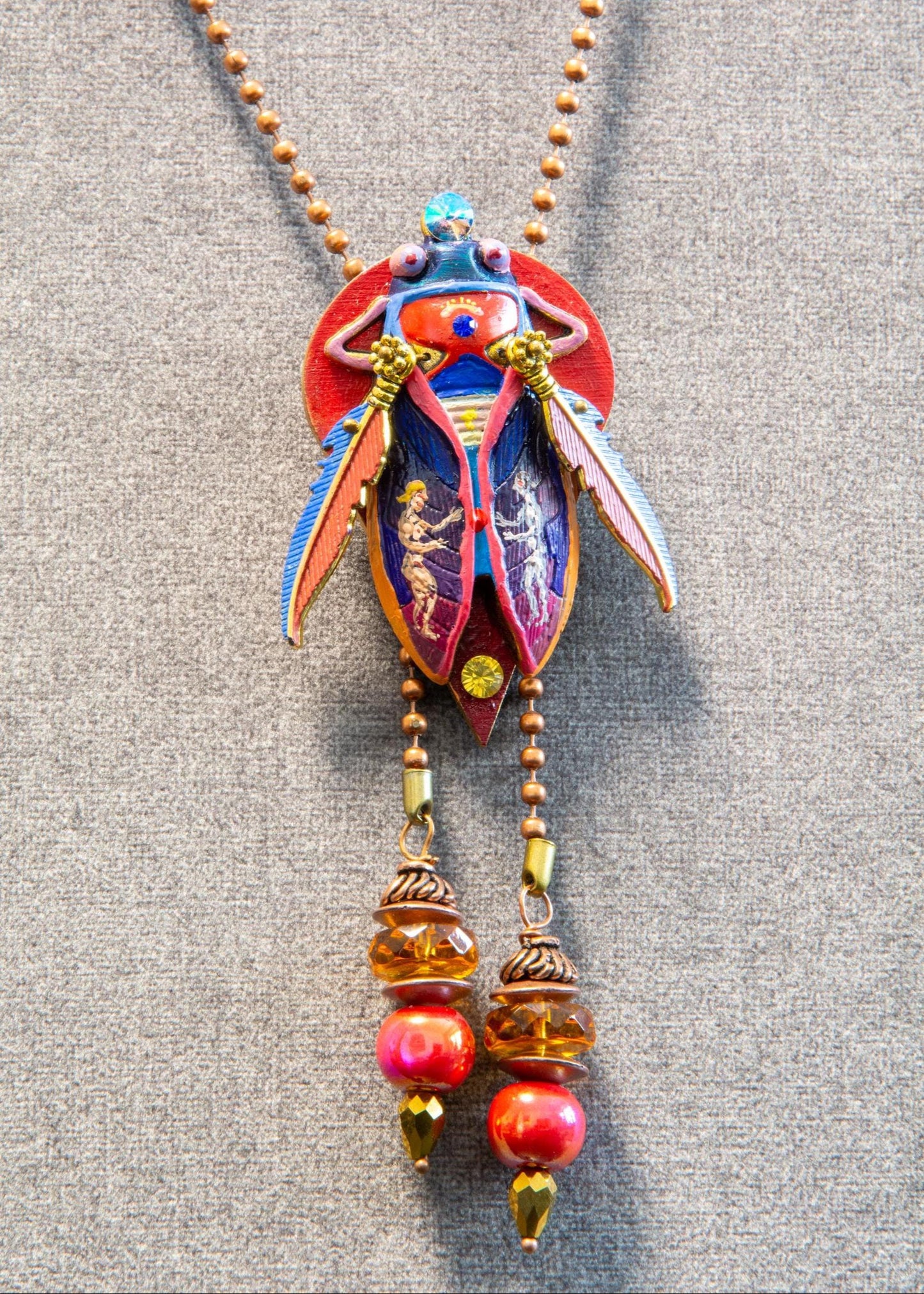 Colorful necklace with decorative pendant on a gray background unique gift for her, art lover gift, handmade jewelry gift, collectible art necklace, luxury statement gift, anniversary gift idea, birthday gift for wife, gift for creative woman, meaningful artistic jewelry, museum style pendant gift, renaissance inspired necklace, fantasy insect jewelry, heirloom style accessory, artisan designer necklace, special occasion jewelry, romantic gift idea, Christmas gift for her, Valentine gift jewelry, one of a k