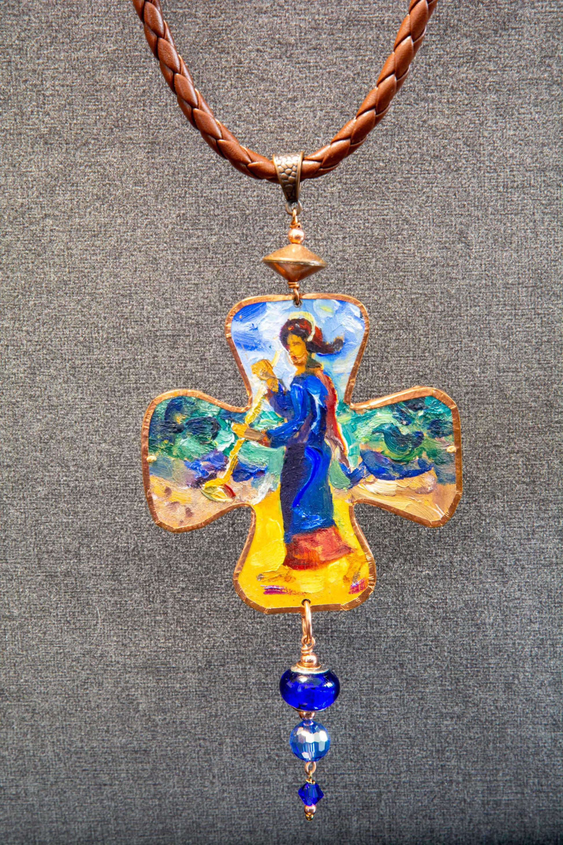 Colorful cross-shaped pendant with artistic design on a gray background Unique artistic pendant for elegant woman, Hand painted miniature art pendant for women one of a kind jewelry, Luxury OOAK miniature painting necklace close up, Original artwork pendant by artist Marijus Piekuras, Fine art wearable pendant handcrafted detail, Tiny original painting inside pendant frame, Woman wearing one of a kind miniature pendant, Meaningful original art gift for her, Intricate miniature art jewelry craftsmanship, Exc