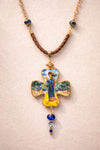 Necklace with a decorative cross pendant on a beige background Unique artistic pendant for elegant woman, Hand painted miniature art pendant for women one of a kind jewelry, Luxury OOAK miniature painting necklace close up, Original artwork pendant by artist Marijus Piekuras, Fine art wearable pendant handcrafted detail, Tiny original painting inside pendant frame, Woman wearing one of a kind miniature pendant, Meaningful original art gift for her, Intricate miniature art jewelry craftsmanship, Exclusive ha