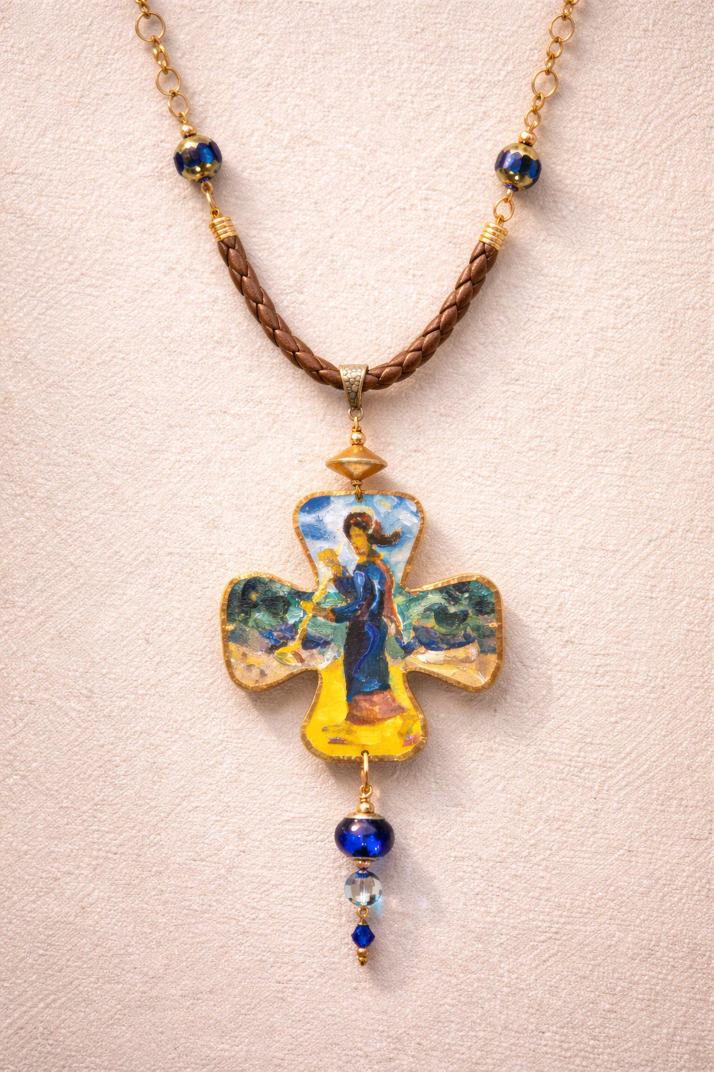 Necklace with a decorative cross pendant on a beige background Unique artistic pendant for elegant woman, Hand painted miniature art pendant for women one of a kind jewelry, Luxury OOAK miniature painting necklace close up, Original artwork pendant by artist Marijus Piekuras, Fine art wearable pendant handcrafted detail, Tiny original painting inside pendant frame, Woman wearing one of a kind miniature pendant, Meaningful original art gift for her, Intricate miniature art jewelry craftsmanship, Exclusive ha