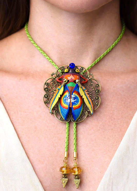 Colorful necklace with a decorative pendant on a person's neck Luxury art pendant for special occasions, Sophisticated wearable art jewelry styling, Unique gift for art lover woman, Meaningful original art gift for her, Collector miniature painting jewelry piece, One of a kind handmade pendant gift idea, Artistic luxury jewelry for refined taste, Exclusive author jewelry by Marijus Piekuras