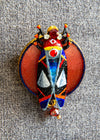 Colorful brooch with spider design on a textured gray background hand painted scarab brooch red black beetle pin, unique artist statement jewelry, one of a kind wearable art brooch, luxury enamel insect pin, bold red black scarab accessory, handmade artistic beetle badge, sculptural statement brooch for blazer, collectible art lover gift jewelry, textured enamel scarab pin, designer insect brooch with gold accents, contemporary art jewelry piece, high quality handmade brooch, distinctive fashion statement 