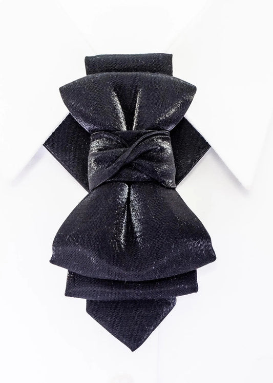 sculptural bow tie alternative, artistic groom tie, refined black necktie, luxury handmade necktie, standout wedding look, unique formal neckwear, contemporary cravat style tie, sophisticated men fashion, modern wedding tie, avant garde tie, elegant men accessory, tailored suit accessory, black statement tie for men, designer neckwear piece, premium fabric tie, formal event accessory, stylish groom outfit detail, minimalist black tie