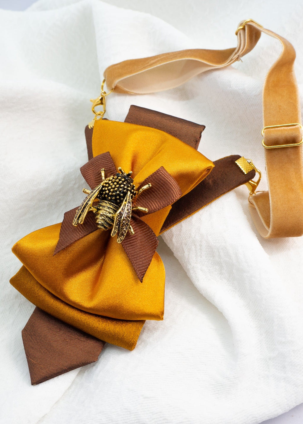 High-quality mustard yellow and gold fabric of the handmade women's bow tie