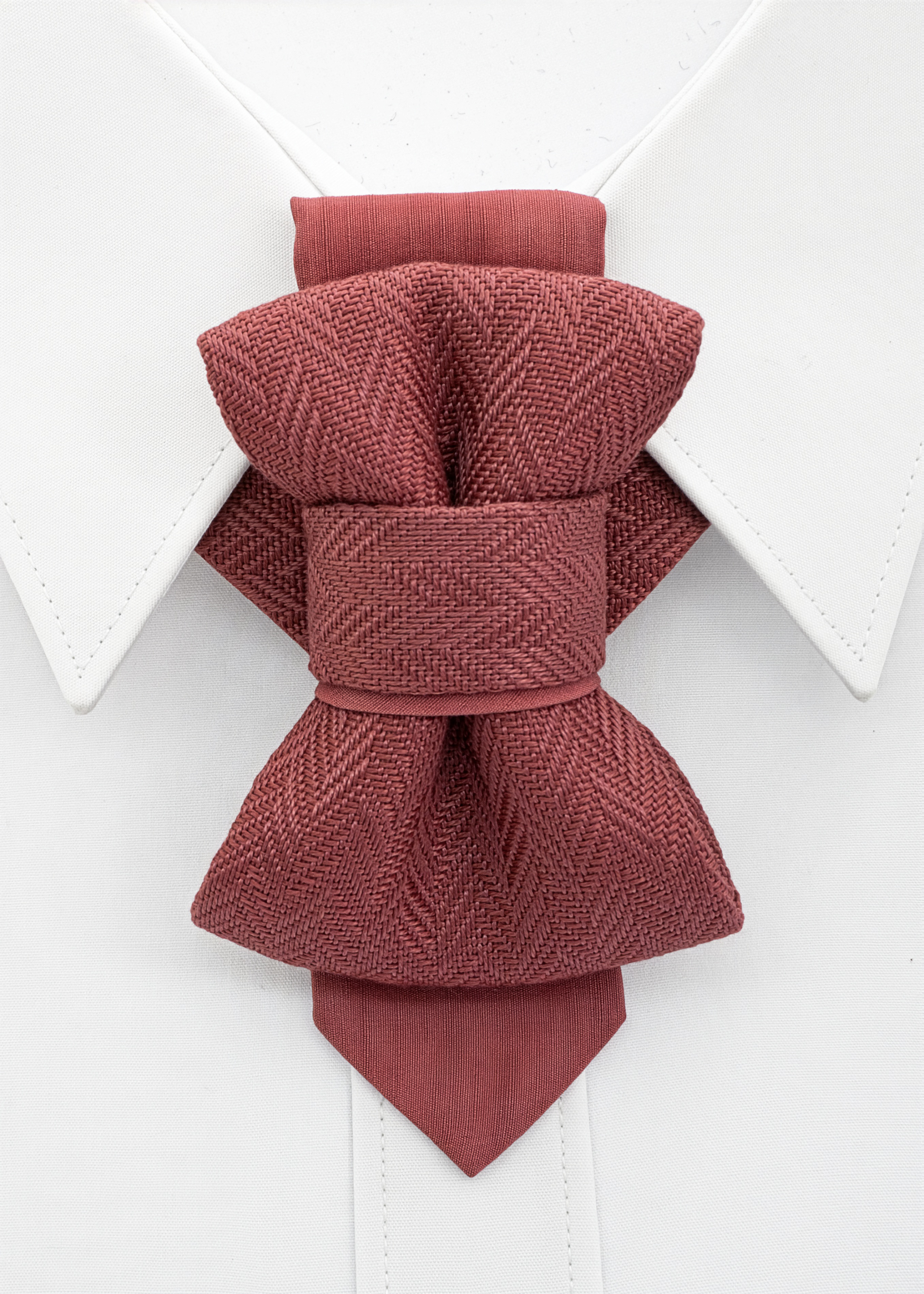 Maroon bow tie on a white shirt collar Red bow tie on a white shirt with a white background handmade pink wedding necktie, luxury artisan bow tie for groom, unique layered pink tie, elegant textured fabric necktie, modern unisex neckwear, herringbone woven linen tie, handmade men’s fashion accessory, luxury pink tie for special occasions, artistic formal necktie, handcrafted groom outfit accessory