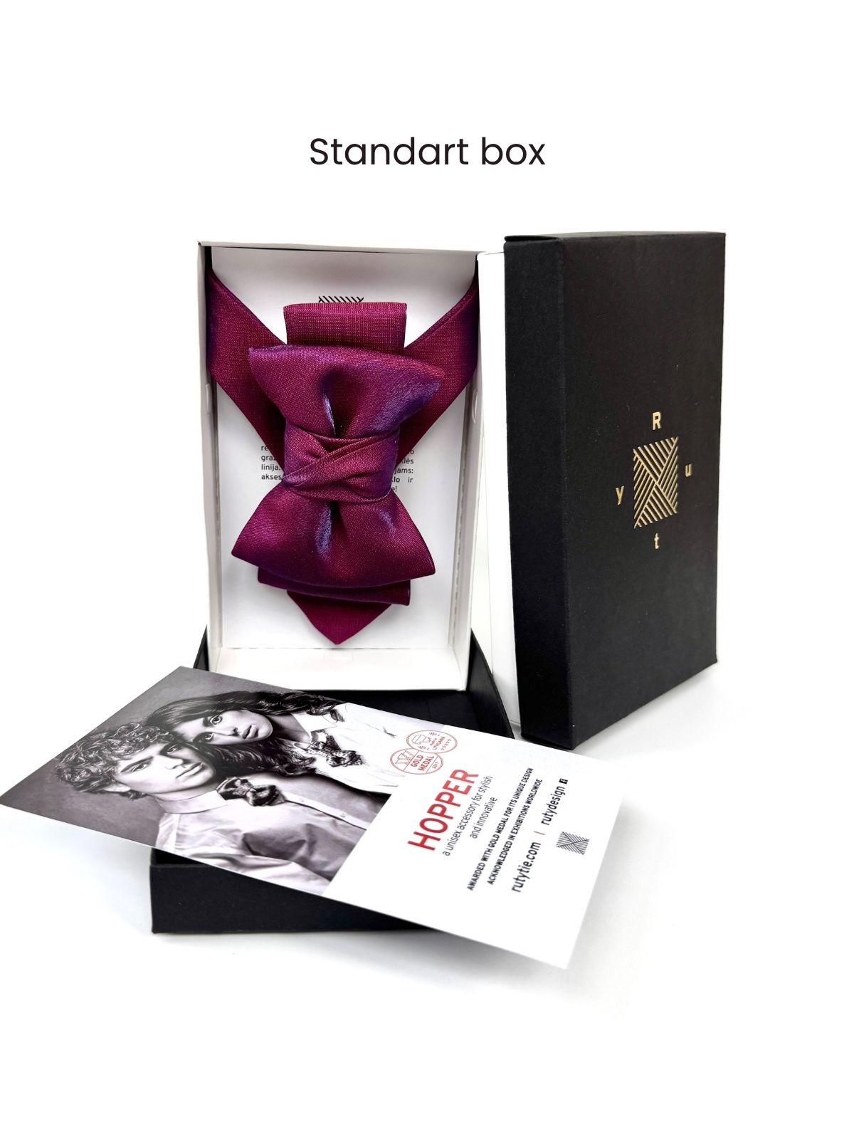 Handmade bow tie presented in a luxury black standard packaging box by Ruty Design, complete with an informational brand card.