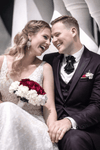 Couple in wedding attire sitting together with a modern architectural  Couple in wedding attire sitting together with a modern architectural  Bow tie, hopper tie, Ruty Design, Vertical hopper hand made a tie, Grooms bow tie, necktie, high-end fashion,  Semi-Formal Look With Stylish Men’s Neckwear, Fashion gift for men,  Vilnius bow tie, Men's Ties, bow tie for men online, Gray bow tie, vertical bow tie, unusual tie for wedding, Wedding Ties for Grooms, keista varlytė, originalus juodas vestuvinis background