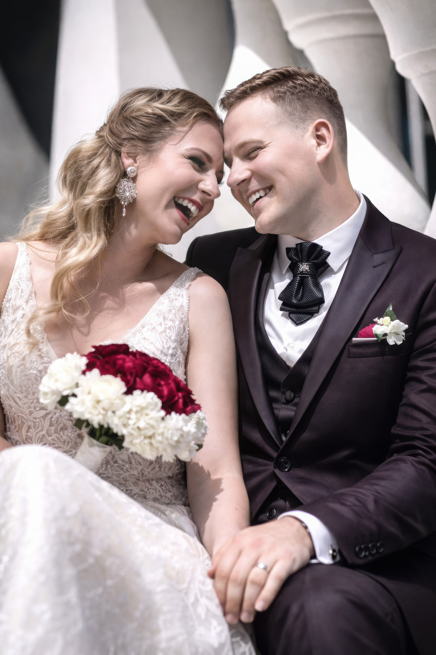 Couple in wedding attire sitting together with a modern architectural  Couple in wedding attire sitting together with a modern architectural  Bow tie, hopper tie, Ruty Design, Vertical hopper hand made a tie, Grooms bow tie, necktie, high-end fashion,  Semi-Formal Look With Stylish Men’s Neckwear, Fashion gift for men,  Vilnius bow tie, Men's Ties, bow tie for men online, Gray bow tie, vertical bow tie, unusual tie for wedding, Wedding Ties for Grooms, keista varlytė, originalus juodas vestuvinis background