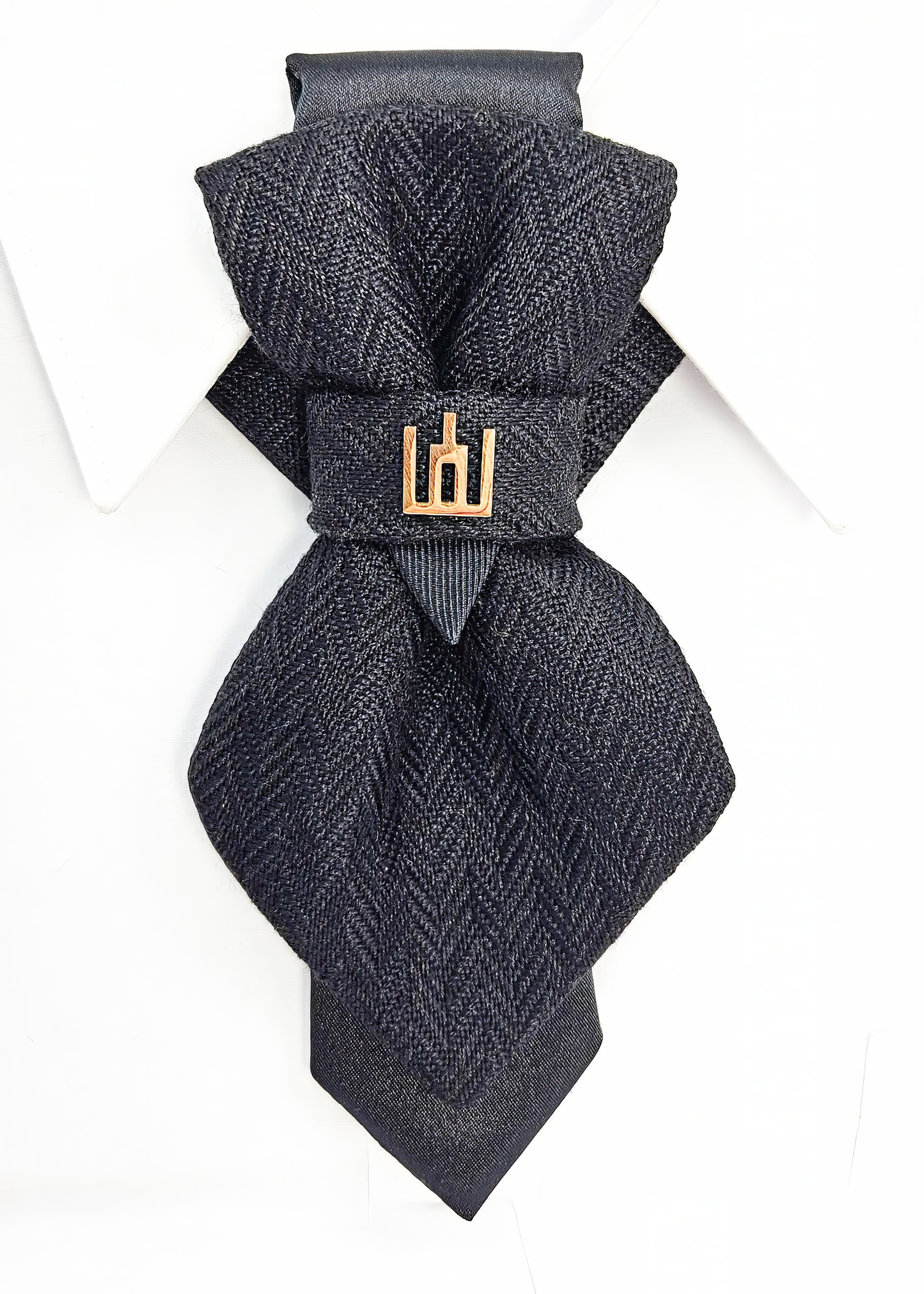 Black patterned tie with a gold clasp background Handmade luxury dark navy blue wool bow tie with leather neck strap and unique gold-tone monogrammed clip. Pre-tied cravat for groom, weddings, formal events, and special occasions. Perfect sophisticated men's accessory.