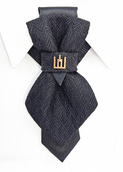 Black patterned tie with a gold clasp background Handmade luxury dark navy blue wool bow tie with leather neck strap and unique gold-tone monogrammed clip. Pre-tied cravat for groom, weddings, formal events, and special occasions. Perfect sophisticated men's accessory.