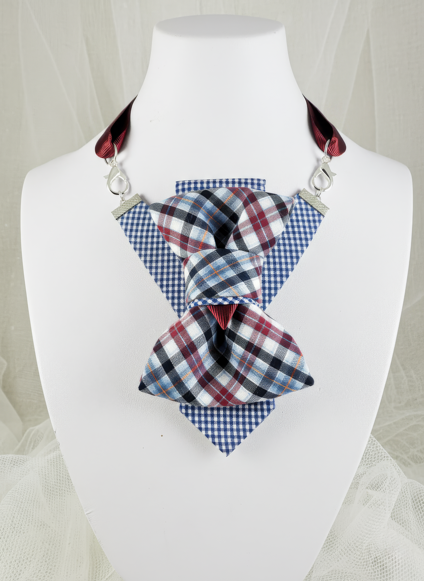 Plaid bow tie on a mannequin with a white background Unseen blue necktie for women, Original design ladies tie, Luxury blue neck accessory for women, Formal women's tie, Elegant female necktie, Stylish handcrafted blue tie, Unique women's fashion accessory, Statement neckwear for women, Modern blue tie for ladies, Sophisticated women's bow tie alternative