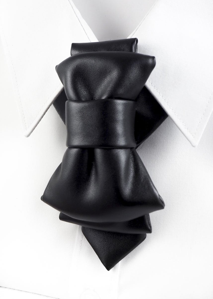 black faux leather bow tie, biker style bow tie, vertical bow tie design, black synthetic leather necktie, edgy men bow tie, unisex bow tie accessory, handmade leather look bow tie, modern statement bow tie, alternative fashion neckwear, biker inspired bow tie, wedding bow tie black, groomsmen bow tie unique, christmas party bow tie, formal leather style bow tie, minimalist black bow tie, stylish men neck accessory, women bow tie fashion, luxury faux leather bow tie