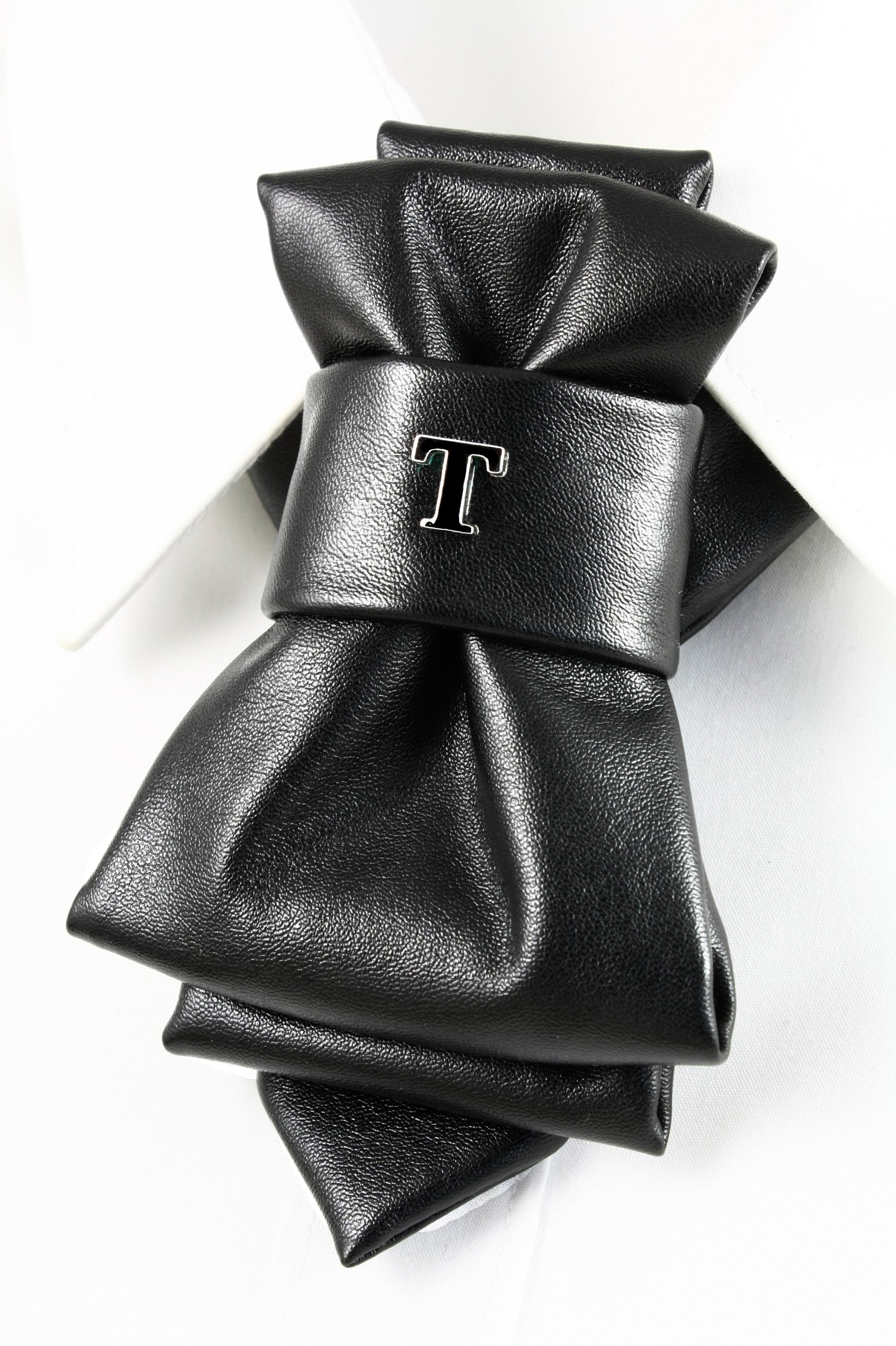 black faux leather bow tie, biker style bow tie, vertical bow tie design, black synthetic leather necktie, edgy men bow tie, unisex bow tie accessory, handmade leather look bow tie, modern statement bow tie, alternative fashion neckwear, biker inspired bow tie, wedding bow tie black, groomsmen bow tie unique, christmas party bow tie, formal leather style bow tie, minimalist black bow tie, stylish men neck accessory, women bow tie fashion, luxury faux leather bow tie