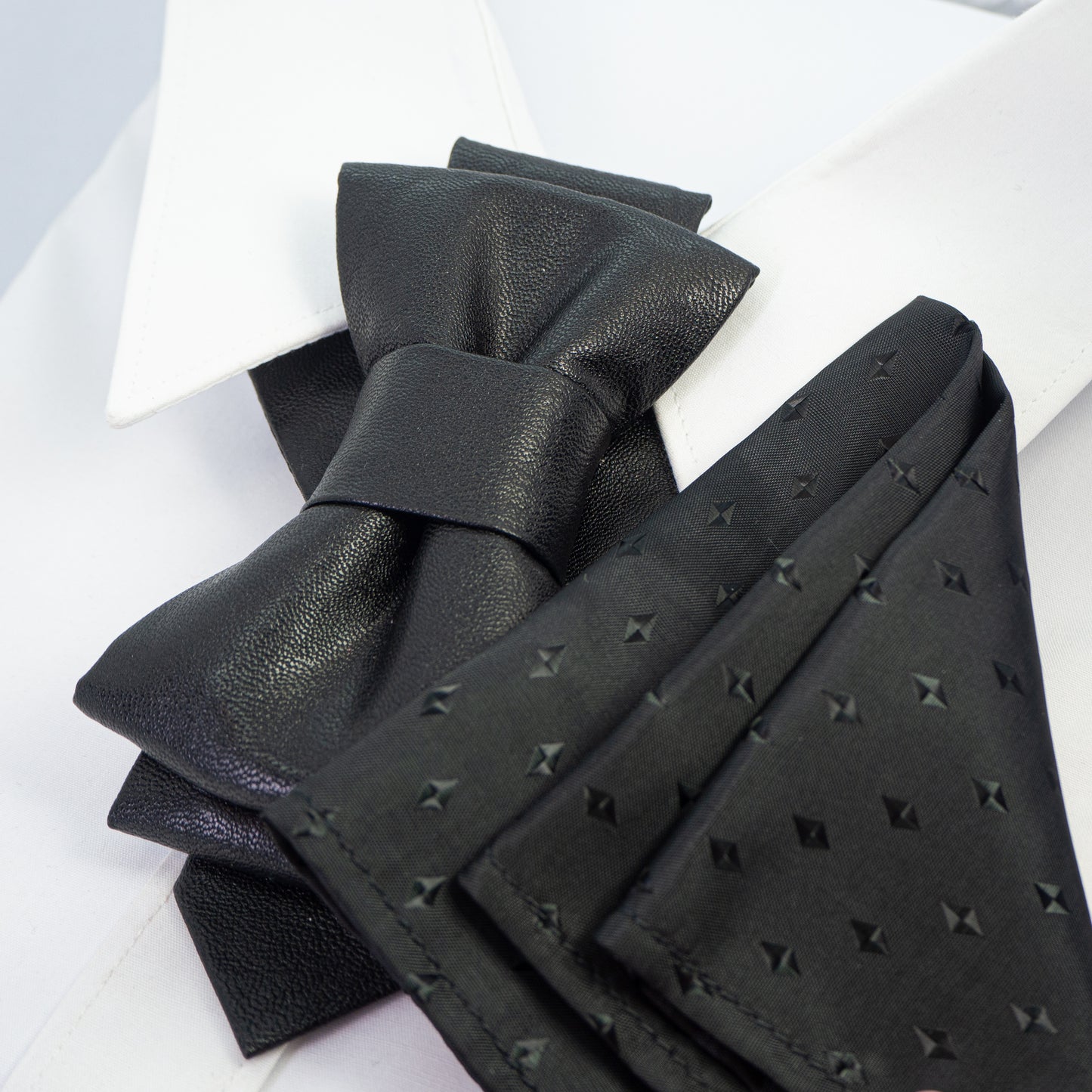 black faux leather bow tie, biker style bow tie, vertical bow tie design, black synthetic leather necktie, edgy men bow tie, unisex bow tie accessory, handmade leather look bow tie, modern statement bow tie, alternative fashion neckwear, biker inspired bow tie, wedding bow tie black, groomsmen bow tie unique, christmas party bow tie, formal leather style bow tie, minimalist black bow tie, stylish men neck accessory, women bow tie fashion, luxury faux leather bow tie