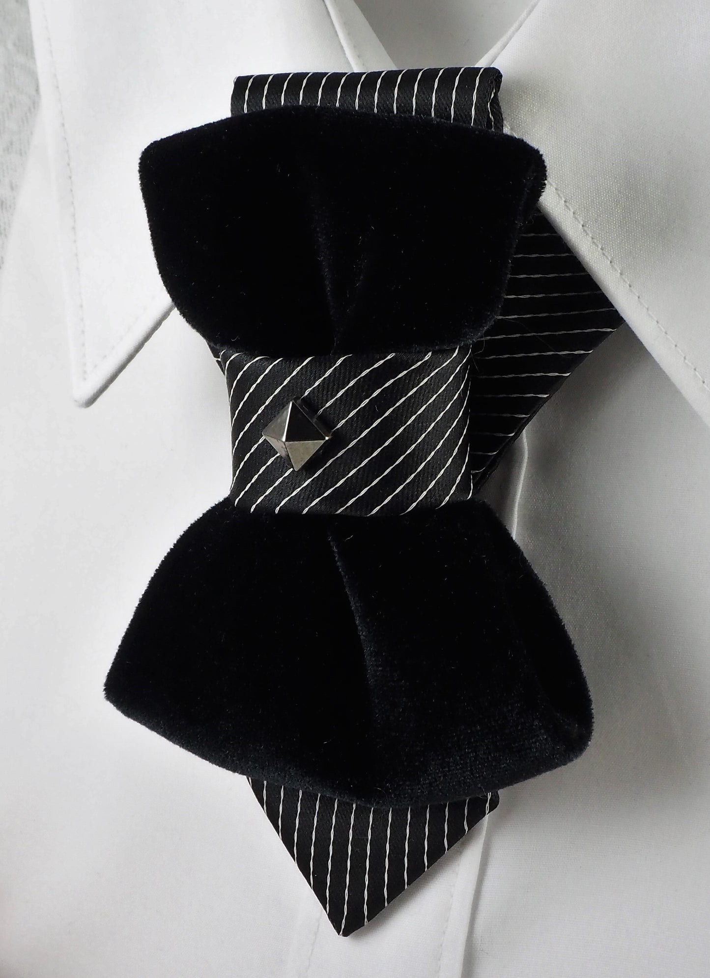 HOPPER TIE POMPEA, Wedding bow tie, Unigue black tie for groom, Handmade luxury necktie, original hopper tie design, unique unisex neck accessory, elegant black velvet bow tie style, striped fabric with silver stud accent, modern artistic fashion piece, Rūta Piekurienė design, stylish statement tie, perfect for weddings, musicians, grooms, formal or casual wear, creative Lithuanian handmade accessory.
