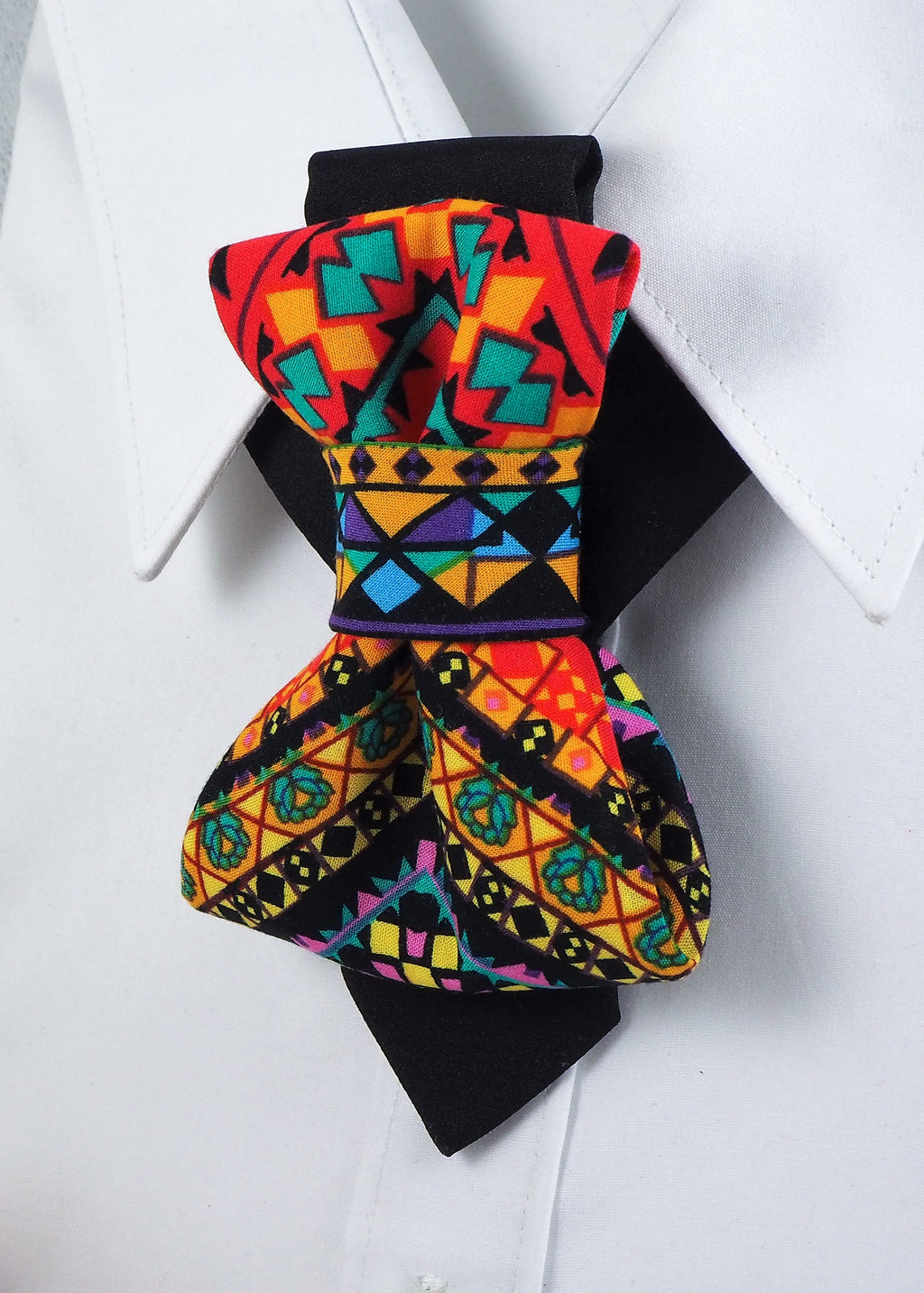 colorful vertical bow tie for wedding

handmade luxury necktie unisex

original designer bow tie by Rūta Piekurienė

bright artistic necktie for men and women

modern elegant bow tie with box

luxury fashion tie from Lithuania

unique colorful tie for special occasions

bold wedding accessory handmade

high-fashion statement tie Kerala

vivid art bow tie for musicians and grooms