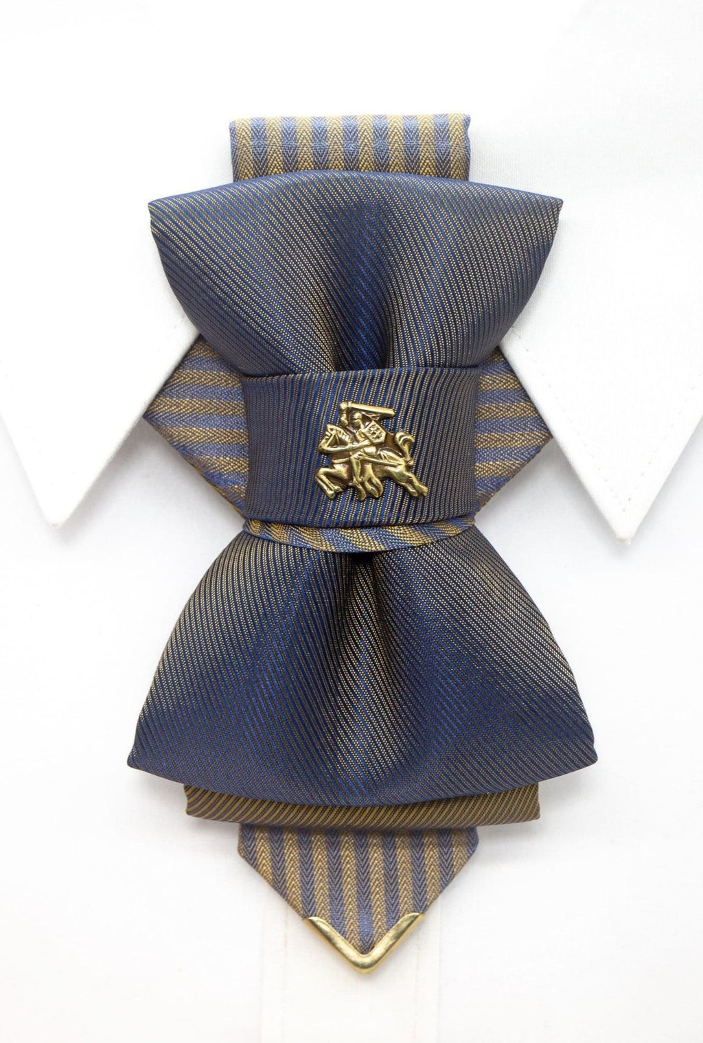 Bow tie "Vilnius 700",Bow tie "Vilnius 700" is a work, dedicated to the birthday of Vilnius, the capital of Lithuania.  Brass Vytis adorns the original knot of three fabrics.